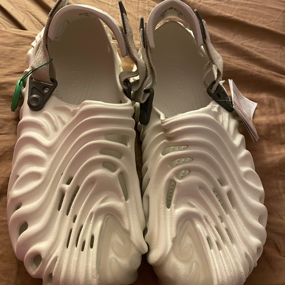 Brand new crocs, style, white, and clear sandal, Velcro by the heel futuristic